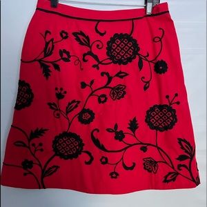 Beautiful embroidered Anthropologie skirt, red with black flowers